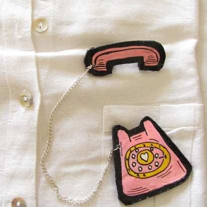 Telephone brooch