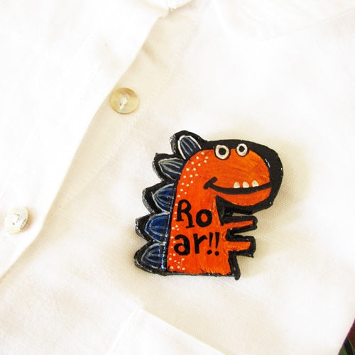 Dinosaur brooch